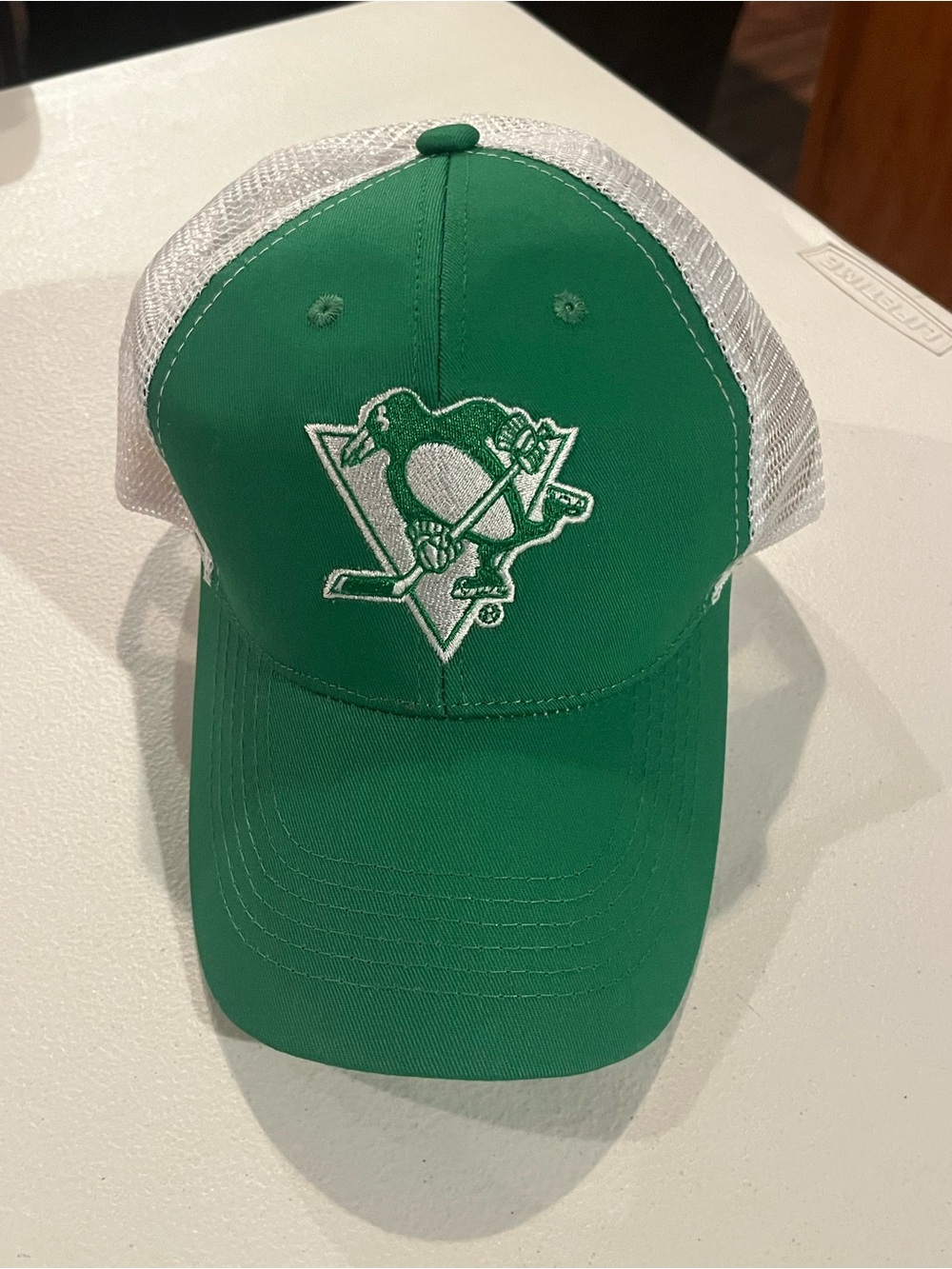 Pittsburgh Penguins St Patrick's Day Trucker Hat ‘He Gets Us’ Logo
